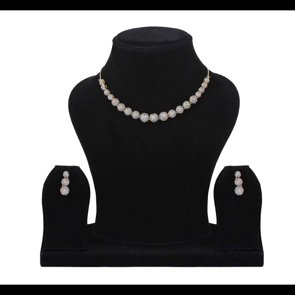 Gold plated set - necklace, bracelet, ring and a pair of earrings